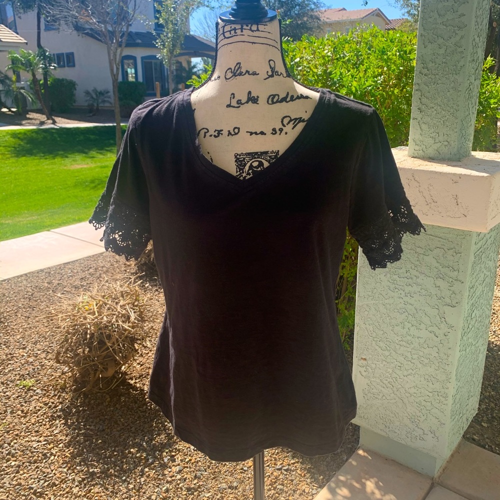 April Cornell black tee with lace sleeve detail . V neck . Worn once . Size M